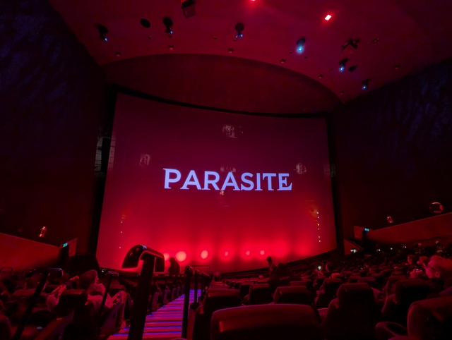 Screen showing slideshow featuring Parasite logo
