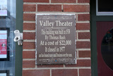 ["Historical plaque on the Valley Theater"]