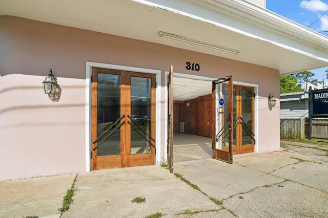 Entrance with original doors