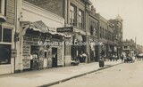 ["Metropolitan Theatre to the right of the Colonial Theatre. 1912 photo credit Wright Studio courtesy Museum of the Great Plains."]