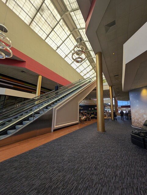 Escalators leading to Upstairs foyer