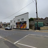 ["Former cafe and passage next to cinema site."]