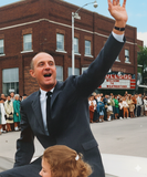 <p>Apollo Astronaut Capt. Thomas Stafford waves at his friends during Southwestern State College homecoming parade at which he was honored Saturday. (AI enhanced)</p>
              
