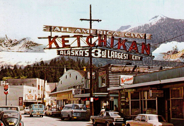 Mid 1960s postcard, Coliseum Twin Theatre background left.