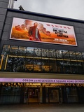 Exterior with poster for Vistavision release of One Battle After Another