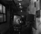 ["Movie projectors at the Columbia Theater in Muncie. Photo Provided By Ball State University Libraries Archives And Special Collections"]