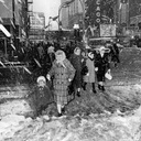 March 29, 1964 photo & description credit John Vogele/Chicago Tribune. "Mrs. Helen Marshall holds the hand of her daughter Gale, 3, as they cross a slushy Randolph Street at State Street."