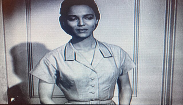 Screenshot from the documentary, 'Sing Your Song' (2012)