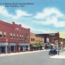 Marquee of East Palestine Theatre on the right in this postcard view of the Market Street business district 