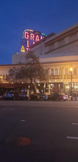 Outside Huge  Grand Lake Theatre  Moving Lights Roof Sign