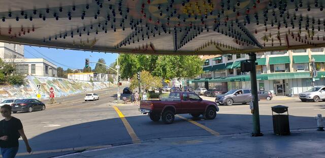 Outside Under Neon Marquee Grand Lake Theatre 