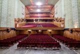Reverse view of the auditorium, balcony, upper balcony and ceiling.