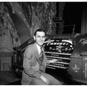 Milton Slosser at the Missouri’s four manual Mighty Wurlitzer.