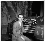 Milton Slosser at the Missouri’s four manual Mighty Wurlitzer.